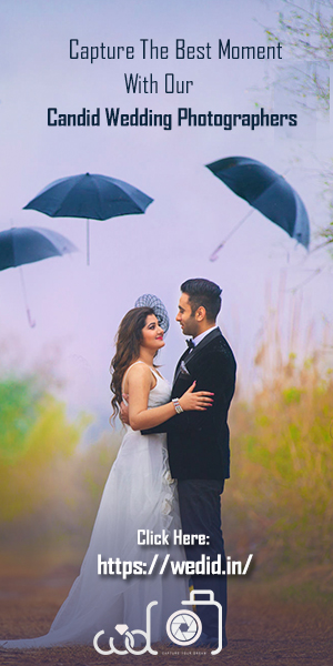 Bride and Groom at wedding day walking Outdoor shot by candid wedding photographer. 